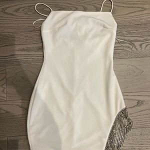 Mini white dress with thigh cut out